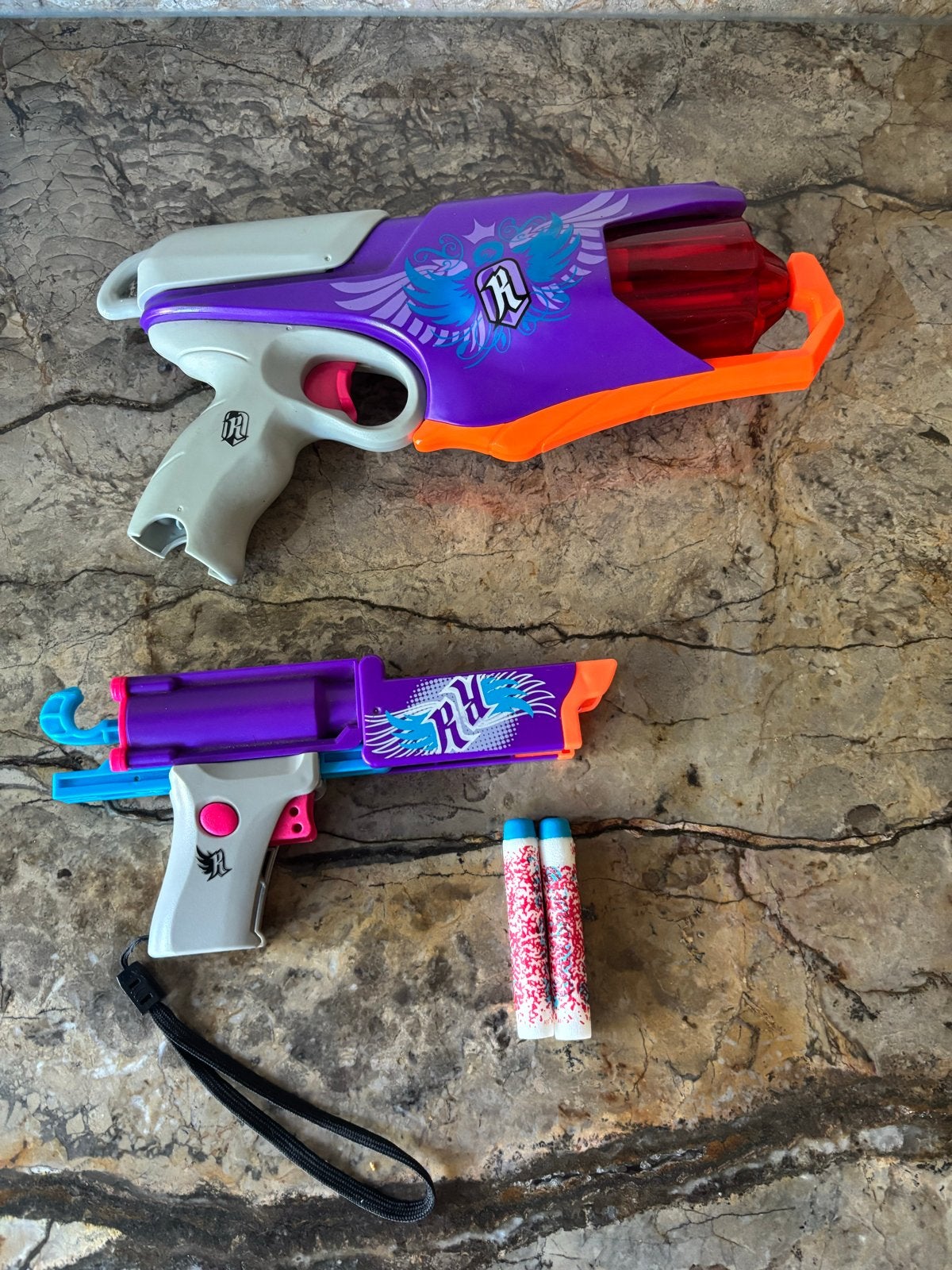 2 paarse Nerf pistolen met 2 kogels, Ophalen of Verzenden, Zo goed als nieuw