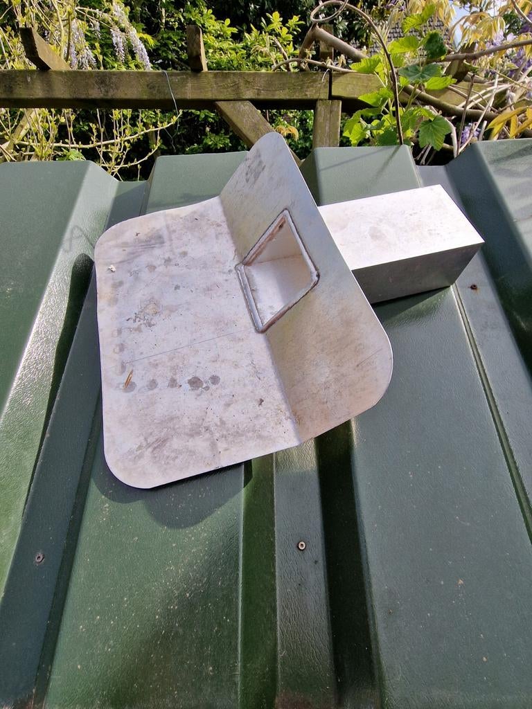 Kiezelbak voor plat dak, Ophalen