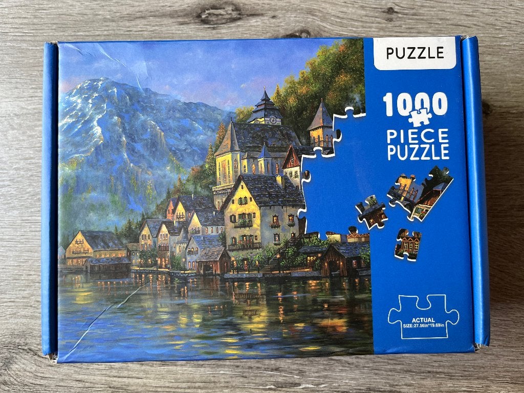 Puzzel Dorpje aan water met bergen, Ophalen of Verzenden, 500 t/m 1500 stukjes, Gebruikt, Legpuzzel