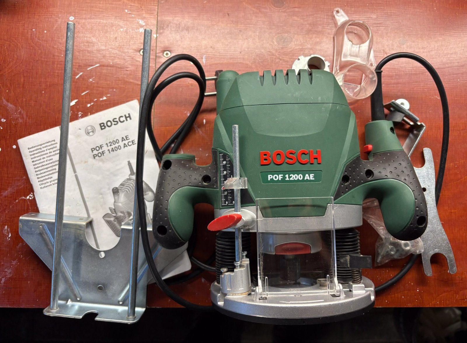 Bosch POF 1200 AE bovenfrees 1200W compleet met accessoires, Ophalen, Zo goed als nieuw, 1000 watt of meer, Haakse handslijpmachine