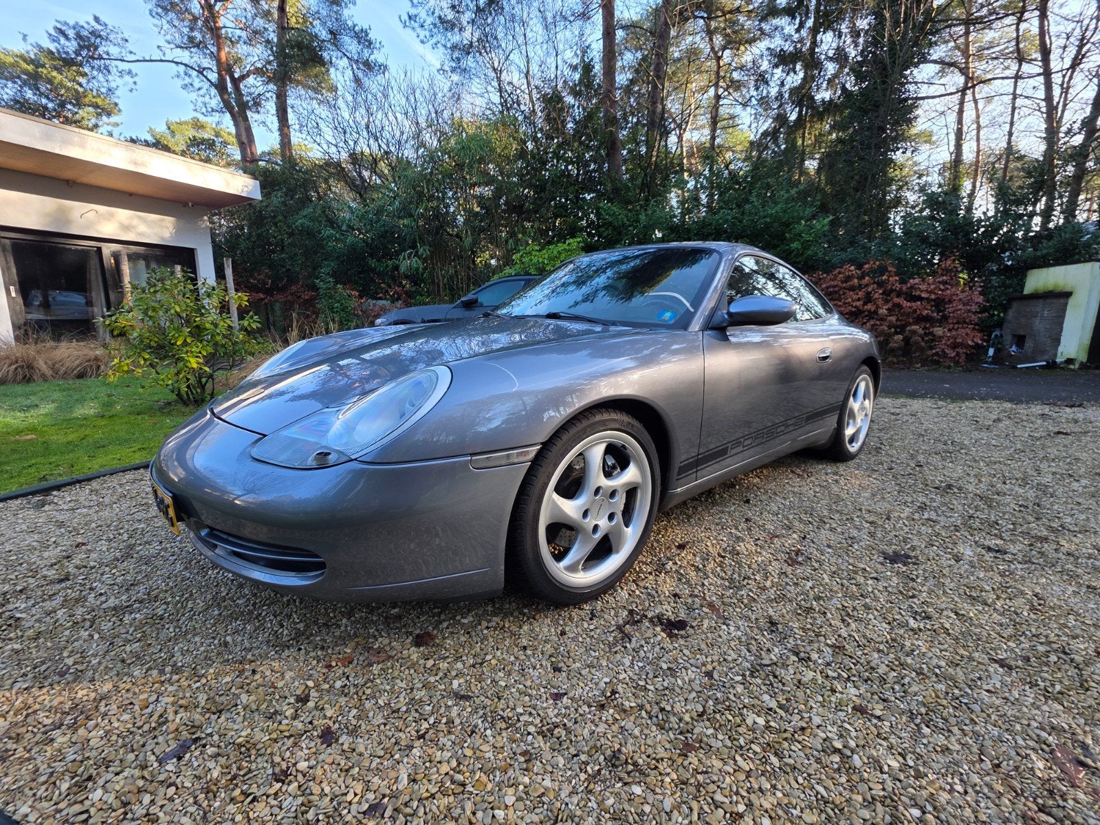 Porsche 911 3.4 996/2 Carrera 4 tiptronic AUT 2001 Grijs, Auto's, Automaat, Zwart, 4 stoelen, Leder