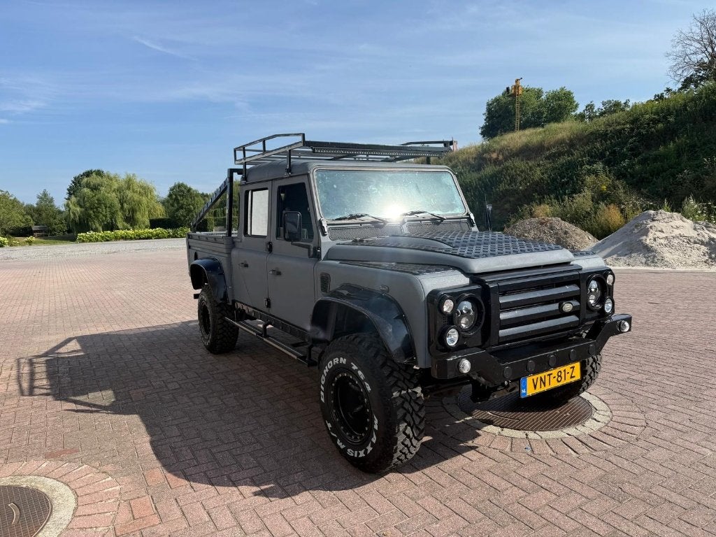 Land Rover Defender 130 Double Cab - Veel Vernieuwd, Auto's, Land Rover, Zwart, Vierwielaandrijving, Stoelverwarming, SUV of Terreinwagen
