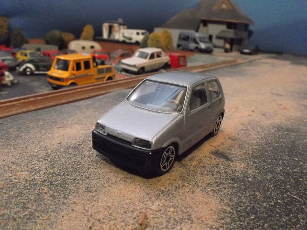 1:43 Fiat Cinquecento - Bburago grijsmetallic, Hobby en Vrije tijd, Modelauto's | 1:43, Ophalen of Verzenden, Gebruikt, Auto, Overige merken