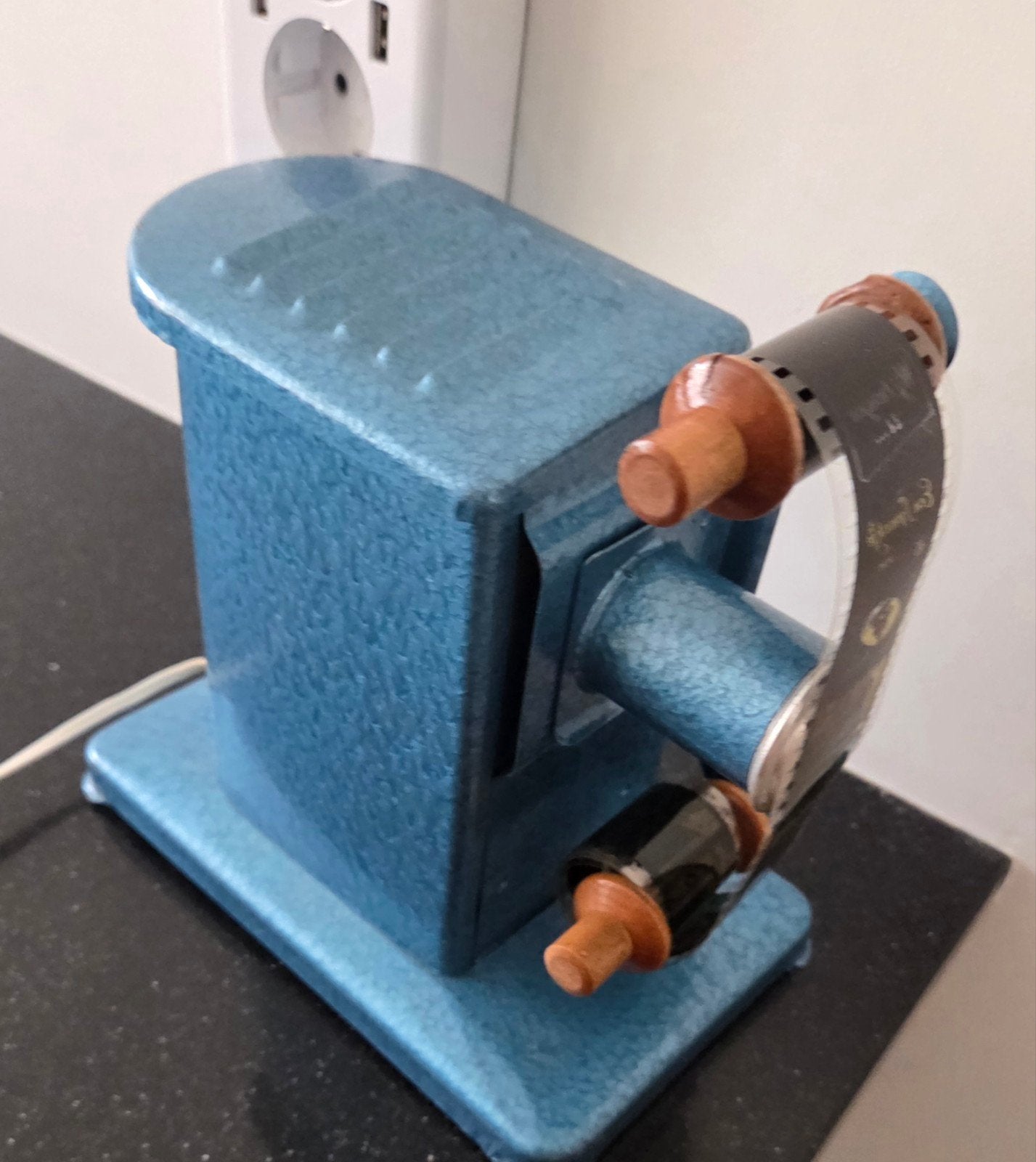 Antieke projector inclusief filmrollen., Antiek en Kunst, Ophalen of Verzenden