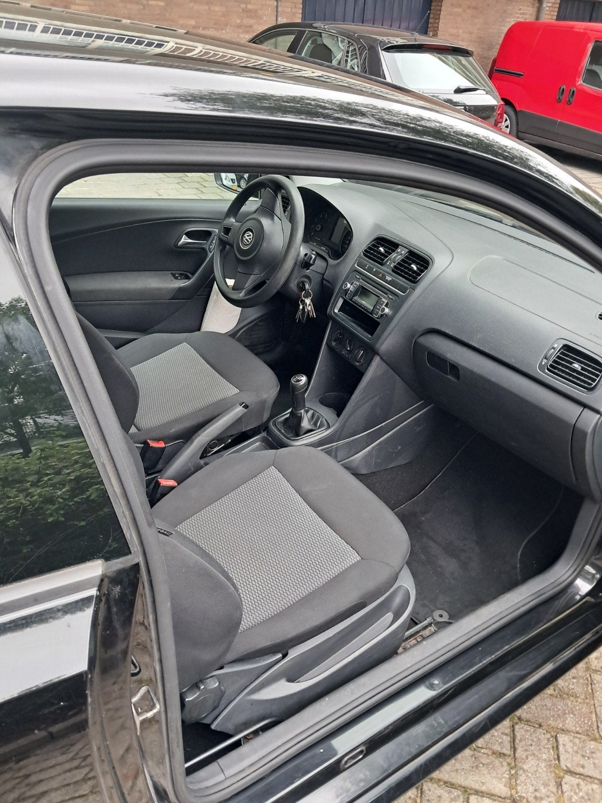 Foto 4 van Volkswagen Polo 1.2 uit 2012 Zwart, 169.193 KM, Airco