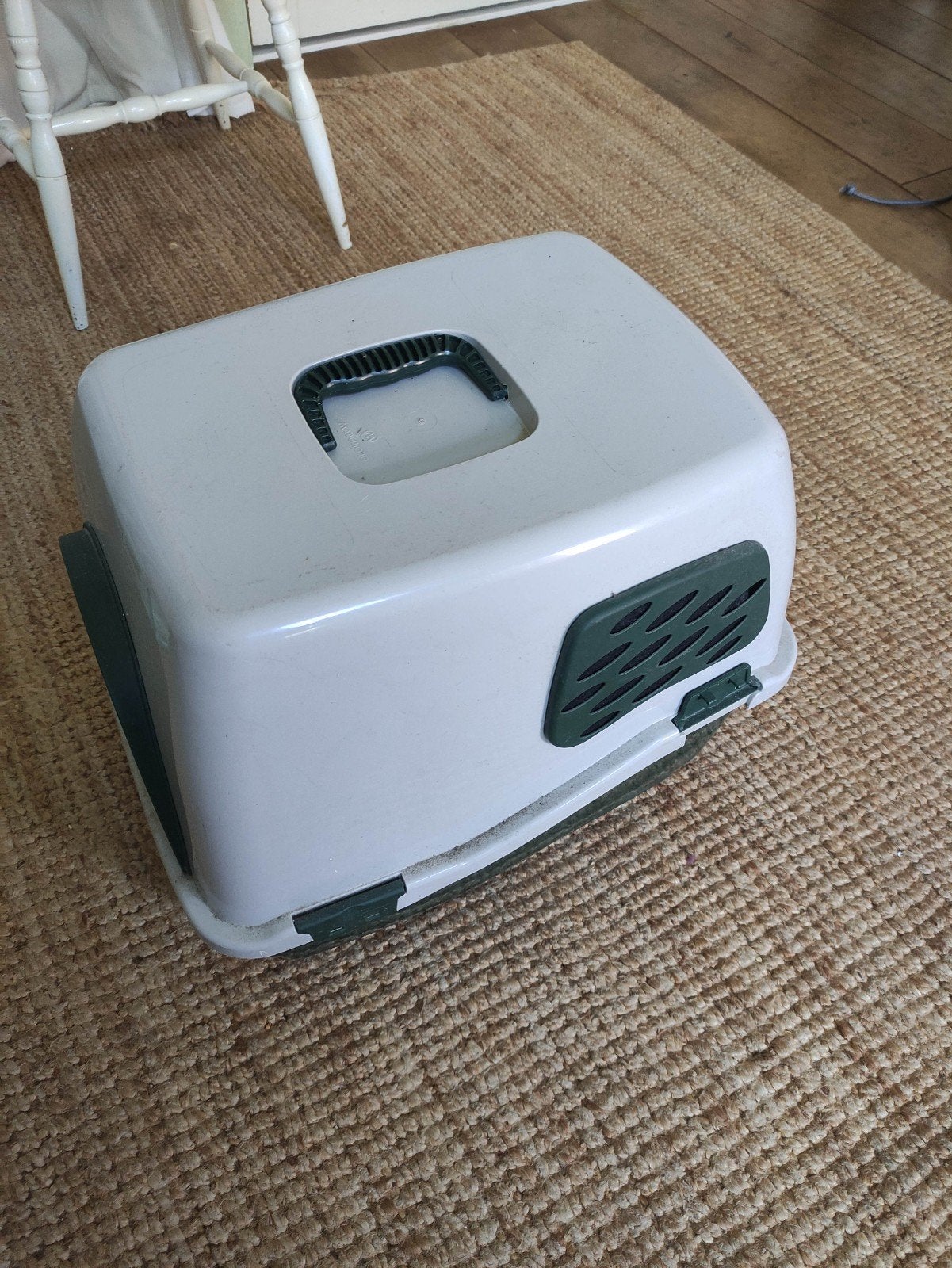 Kattenbak met klepje luikje, Ophalen