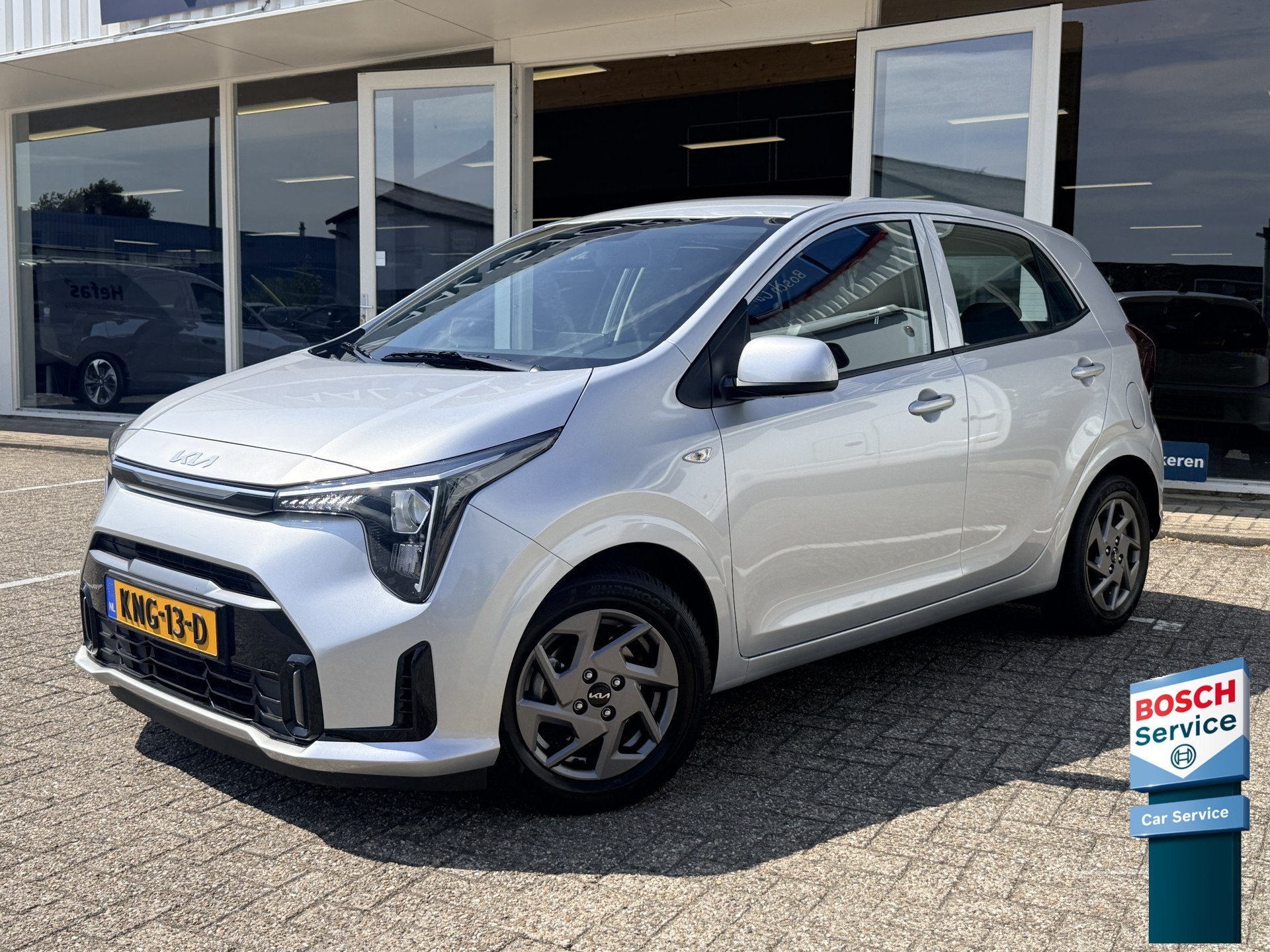 Kia Picanto 1.0 DPI DynamicLine | Stoel- en stuurverwarming, Stof, Navigatiesysteem, 4 stoelen, Bedrijf
