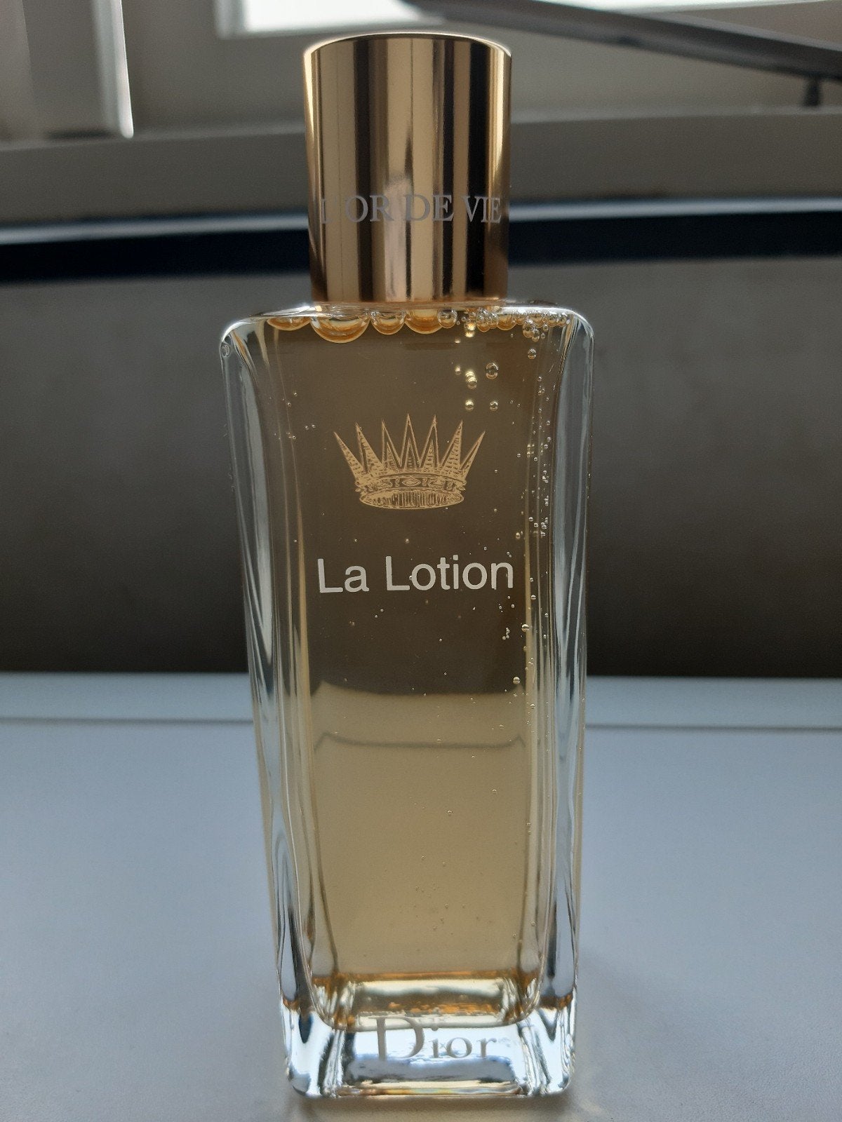 Dior L'or De Vie La Lotion 180ML., Verzenden, Nieuw, Gehele gezicht, Verzorging