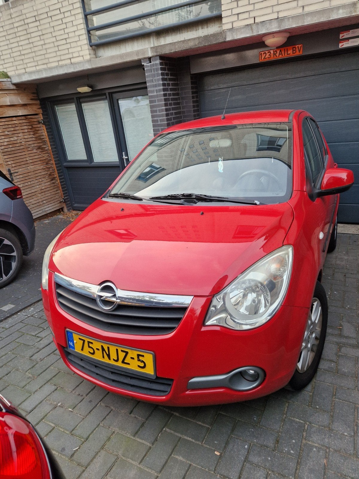 Opel Agila 1.0 12V LPG 2010 Rood, 996 cc, Origineel Nederlands, Bedrijf, Handgeschakeld