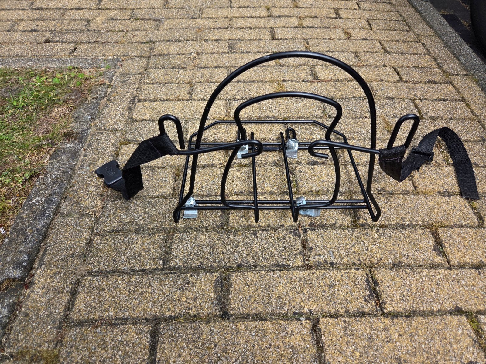 Tassenrek voor fiets, Ophalen