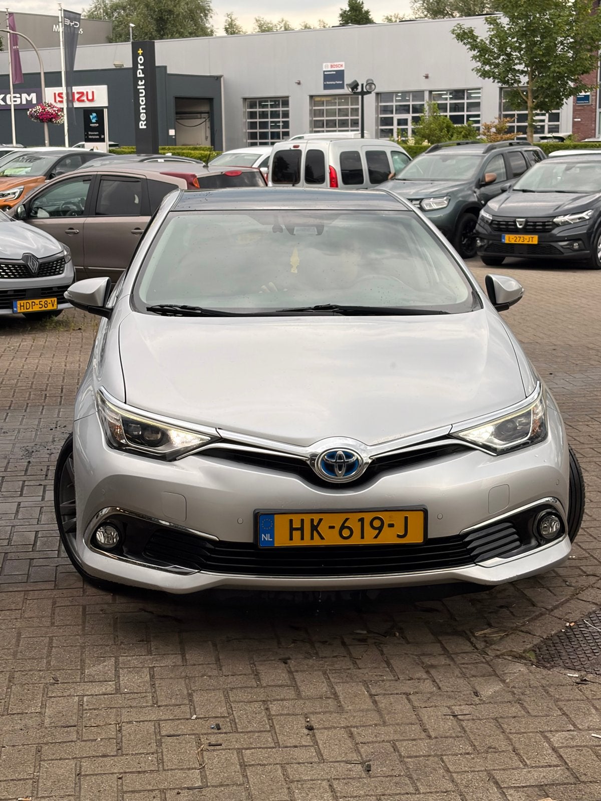 Toyota Auris 1.8 Hybrid 5DR CVT 2015 Grijs, Auto's, Toyota, 28 km/l, Origineel Nederlands, Auris, 1285 kg