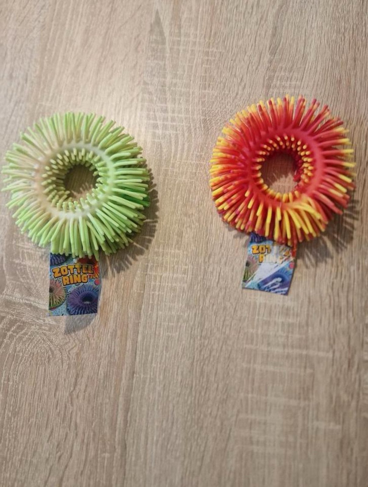 Zottel Ring Fidget Speelgoed - Groen en Rood/Geel, Ophalen of Verzenden, Nieuw, Jongen of Meisje