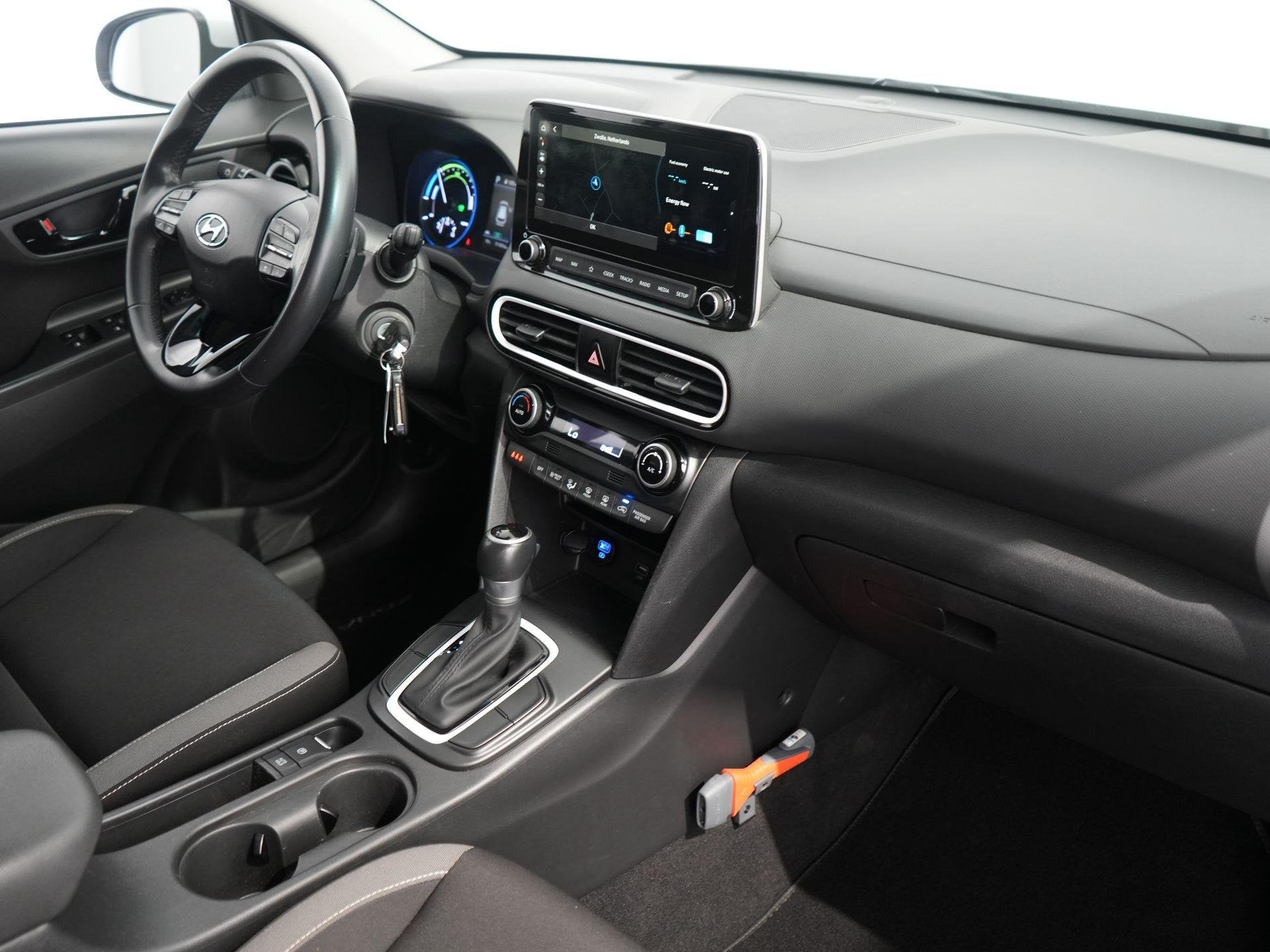 Hyundai Kona 1.6 GDI HEV Comfort | Trehaak | ACC | Camera |, Auto's, Stof, Gebruikt, Euro 6, 2 kWh