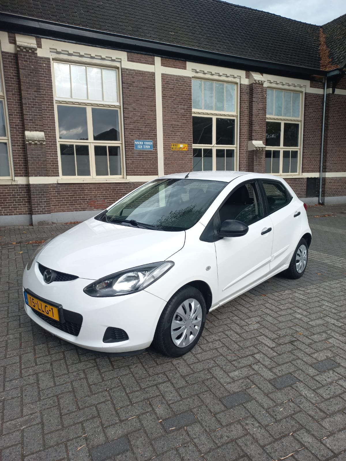 Mazda 2 1.3 55KW 5DRS 2010 Wit airco, Voorwielaandrijving, 74 pk, 31 €/maand, 4 cilinders