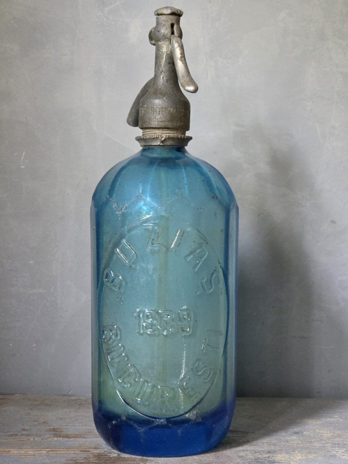 Antieke blauwe spuitfles, Verzenden