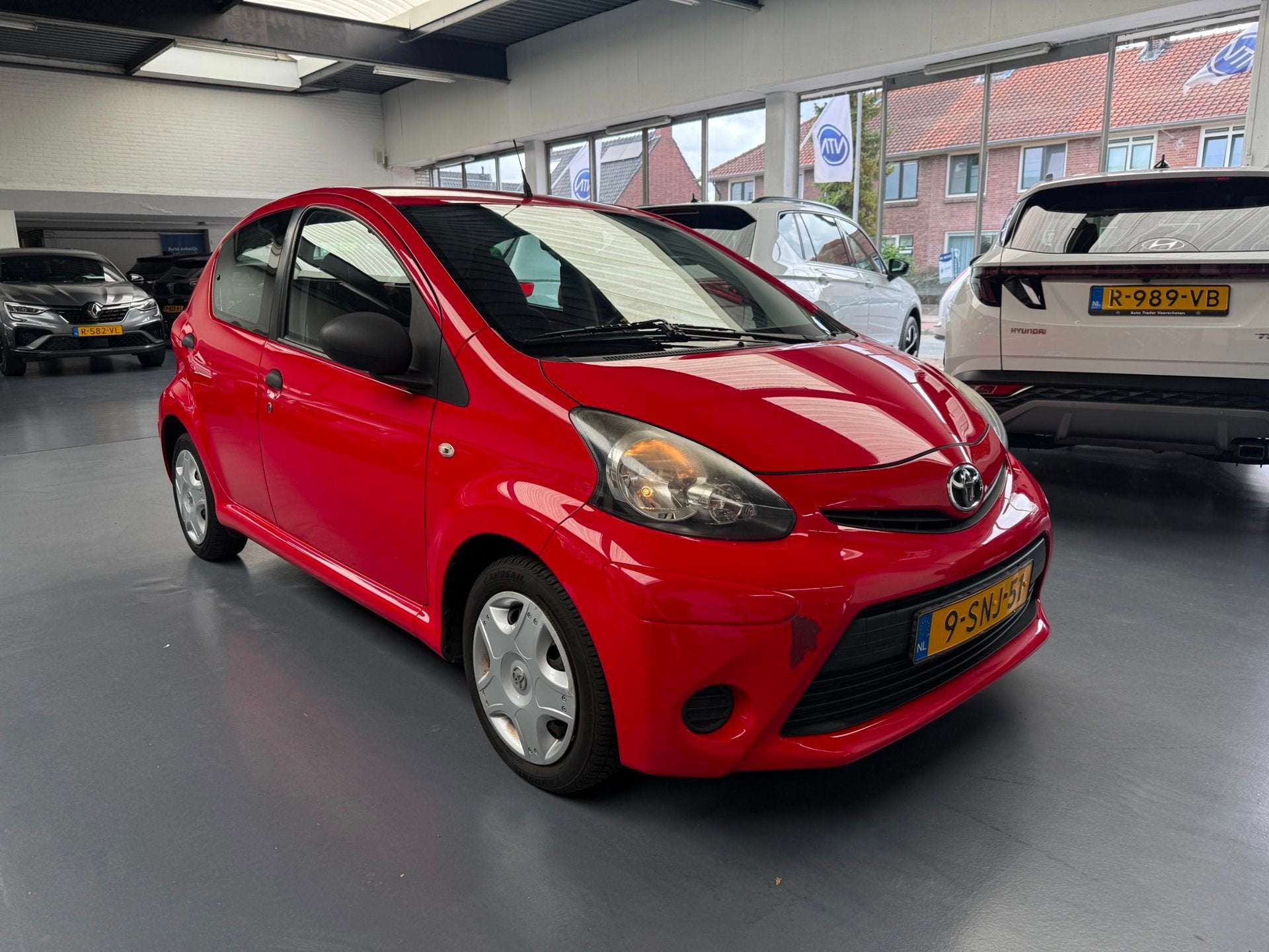 Toyota Aygo 1.0 VVT-i Now |Airco|Elektr ramen|NAP|, Auto's, Voorwielaandrijving, Euro 5, Stof, Gebruikt