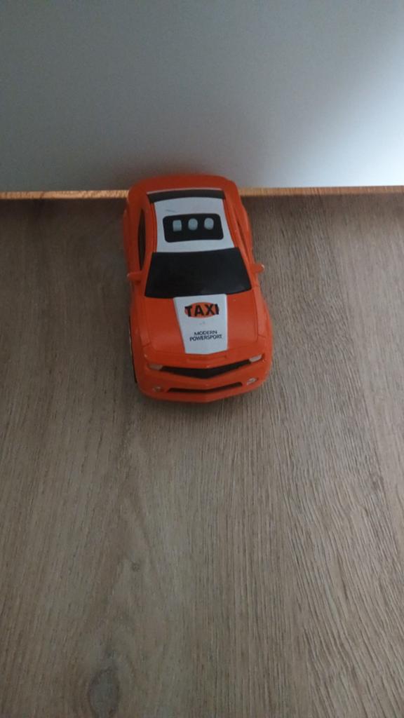 Oranje speelgoedauto 'Taxi Modern Powersport', Ophalen of Verzenden, Gebruikt