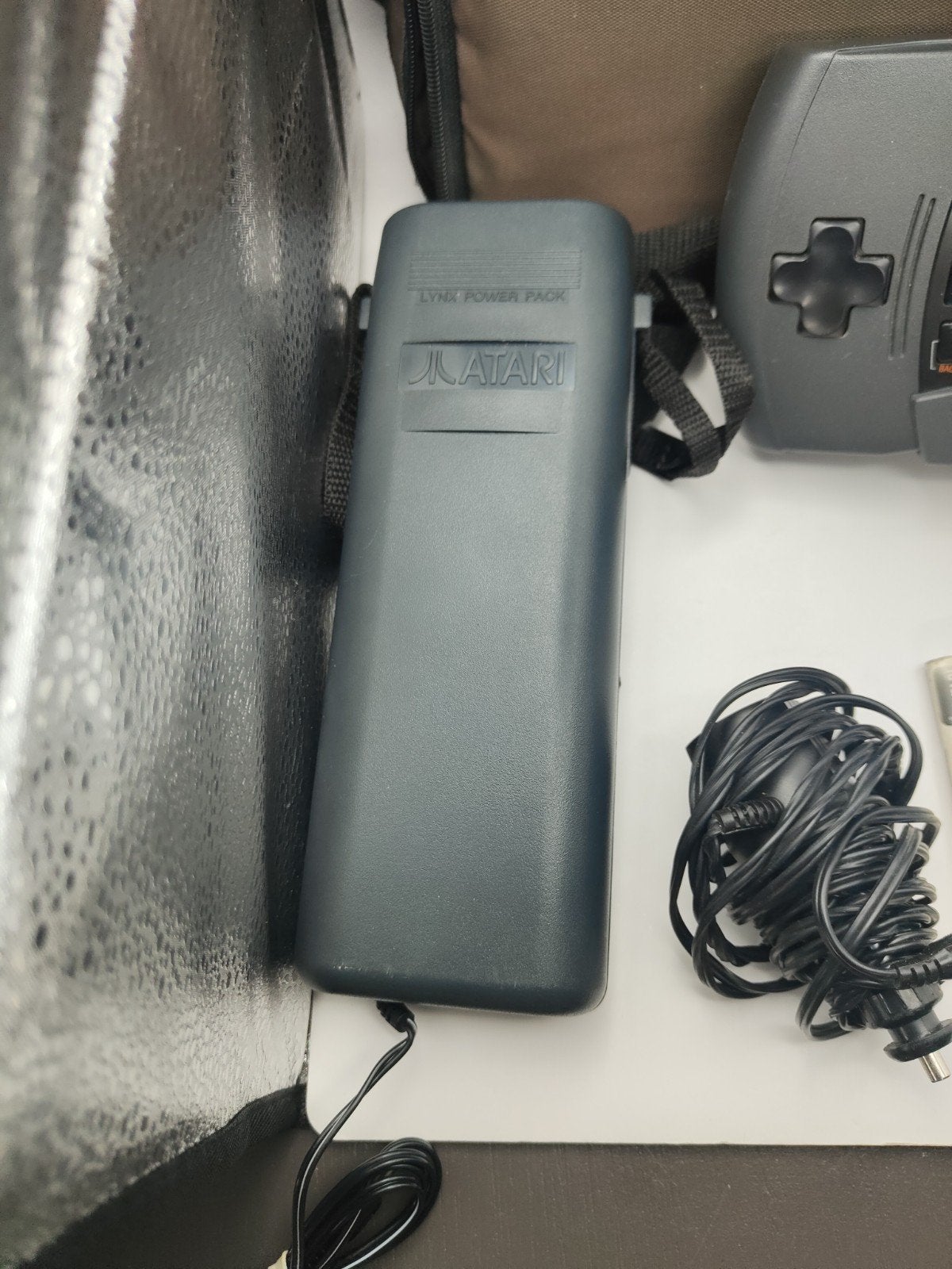 Atari Lynx met tas, power pack, handleiding en game, Atari, Onbekend, Ophalen of Verzenden, Zo goed als nieuw