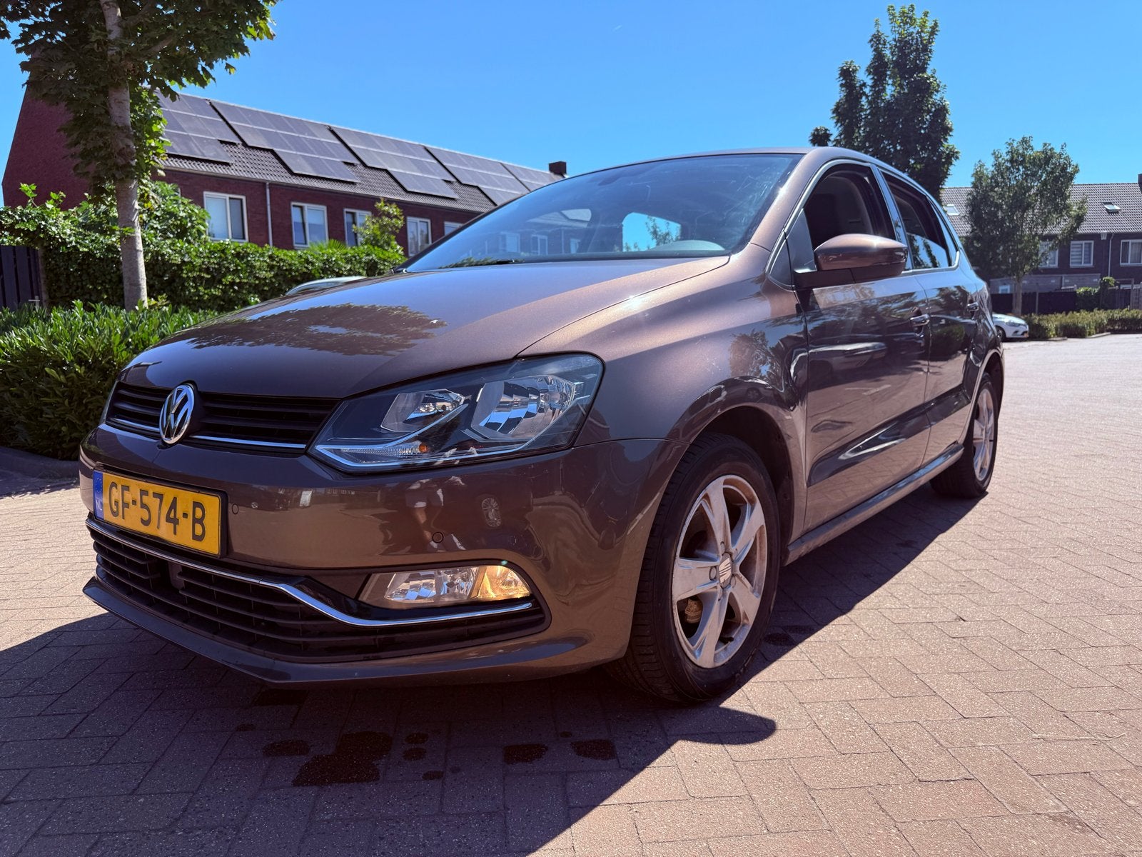 Volkswagen Polo 1.2 TSI 66KW 2015 Bruin, Auto's, 40 €/maand, 4 cilinders, Bruin, Origineel Nederlands