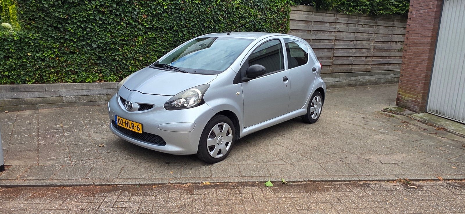 Toyota Aygo 1.0 12V Vvt-i 5DRS 2009 Grijs, Auto's, Voorwielaandrijving, 4 stoelen, 68 pk, Origineel Nederlands