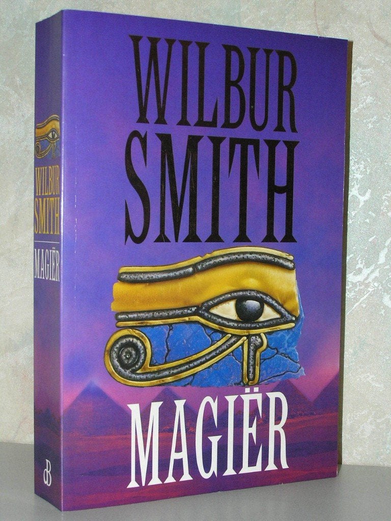 Wilbur Smith - Magiër (grote paarse paperback), Ophalen of Verzenden, Zo goed als nieuw