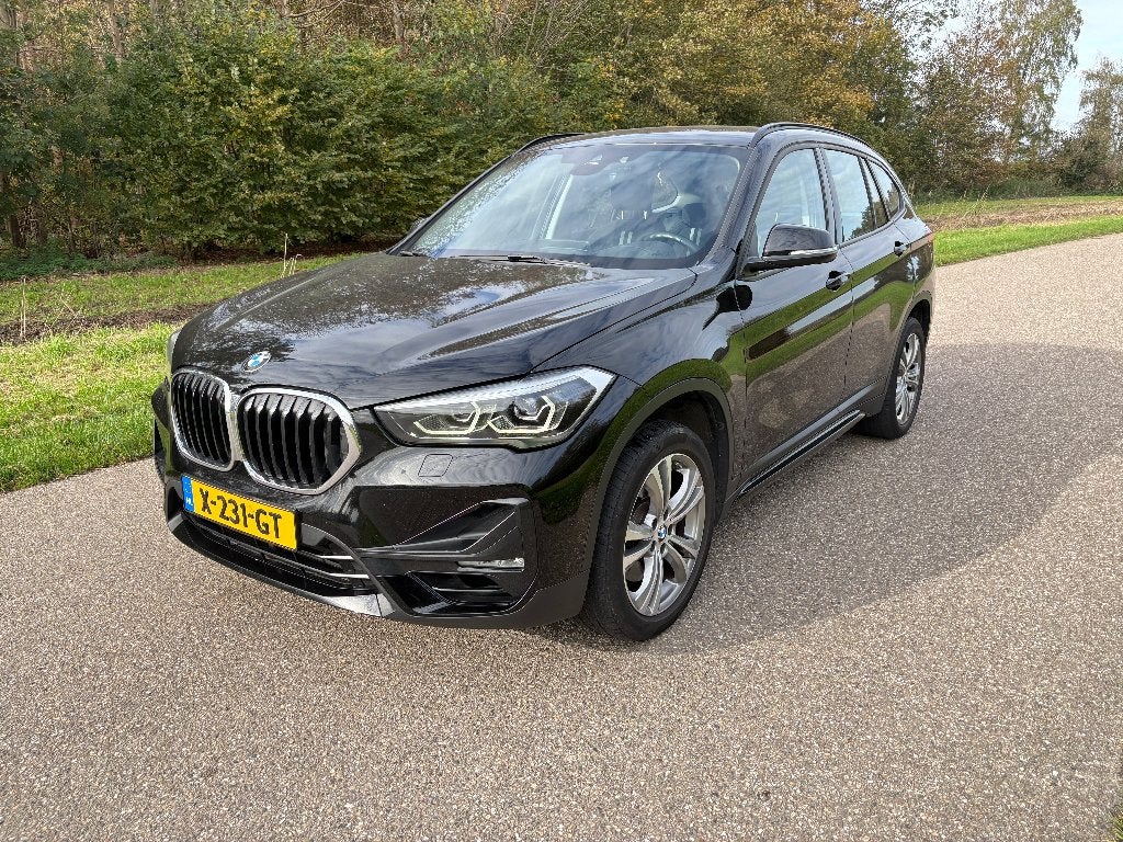 BMW X1 sDrive20i Aut | 192 PK |  2019 | 78.500 km | Zwart, 1998 cc, 1800 kg, Leder en Stof, Zwart