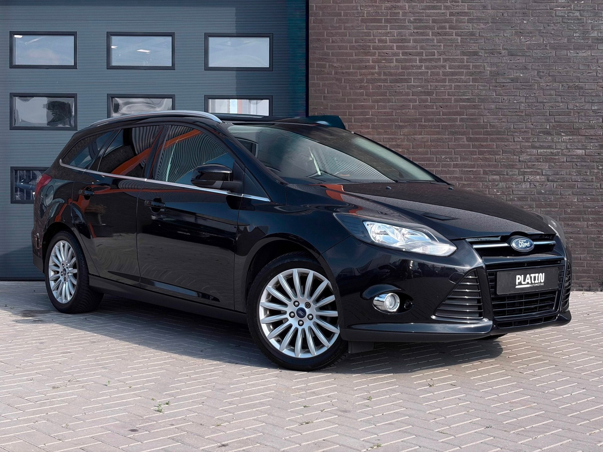 Ford Focus Wagon 1.0 EcoBoost Titanium|Cruise|NW Distr|APK, Euro 5, Gebruikt, Zwart, Zwart