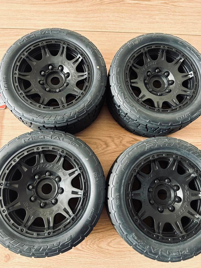 Proline 1/6 Menace HP BELTED Fr/Rr 5.7″ MT Tires Mounted, Ophalen of Verzenden, Zo goed als nieuw, Overige schalen, Onderdeel
