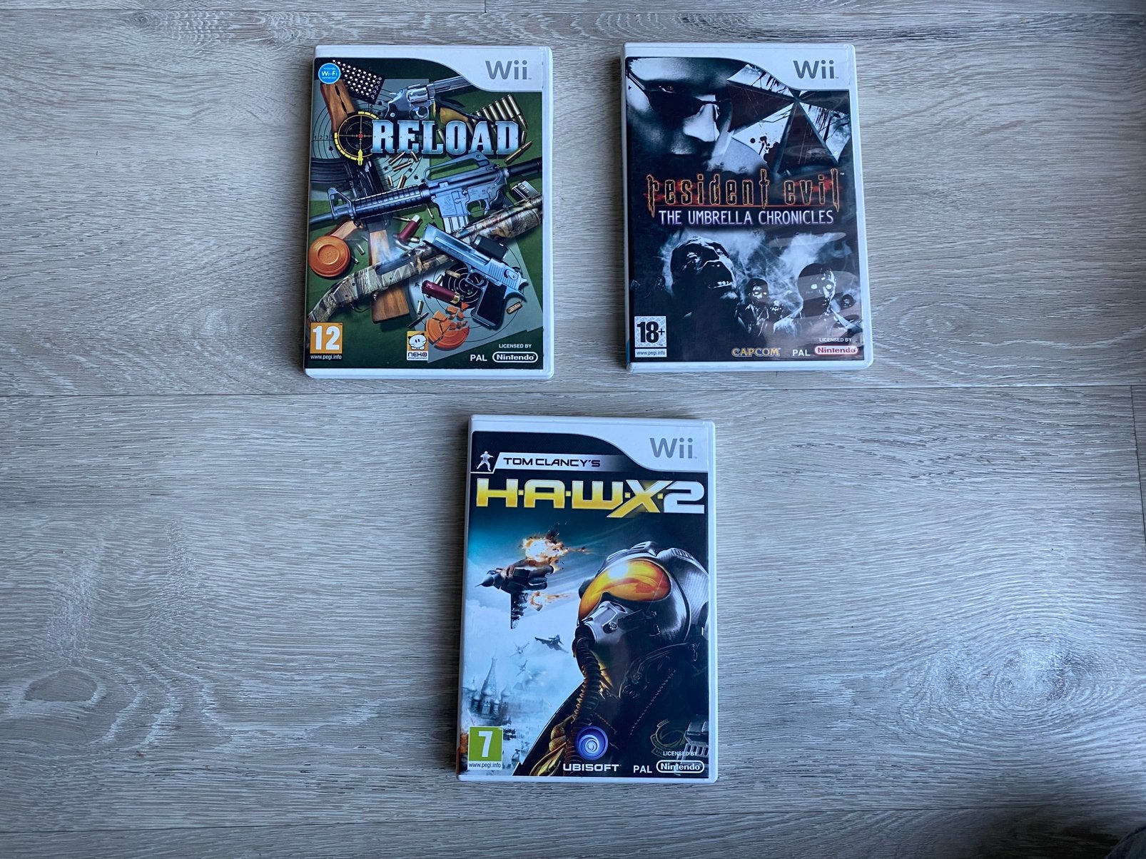 3 Wii games. Reload, Tom Clancy, Resident Evil, Spelcomputers en Games, Avontuur en Actie, Gebruikt, Vanaf 18 jaar, 1 speler