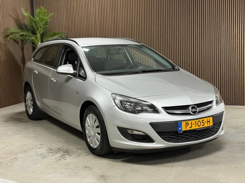 Opel Astra Sports Tourer 1.4 Turbo Edition (bj 2015), Auto's, Opel, Stof, Gebruikt, Euro 6, 4 cilinders