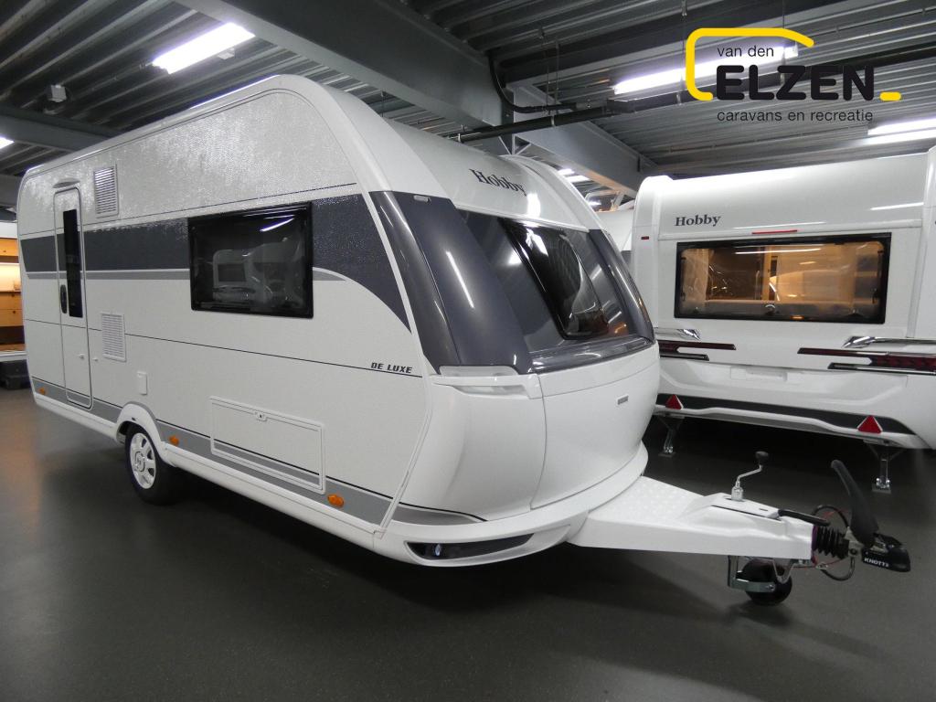 Hobby De Luxe 460 SL White Edition actiepakket, Caravans en Kamperen, Caravans, Hobby, Bedrijf, Treinzit, Tot en met 3