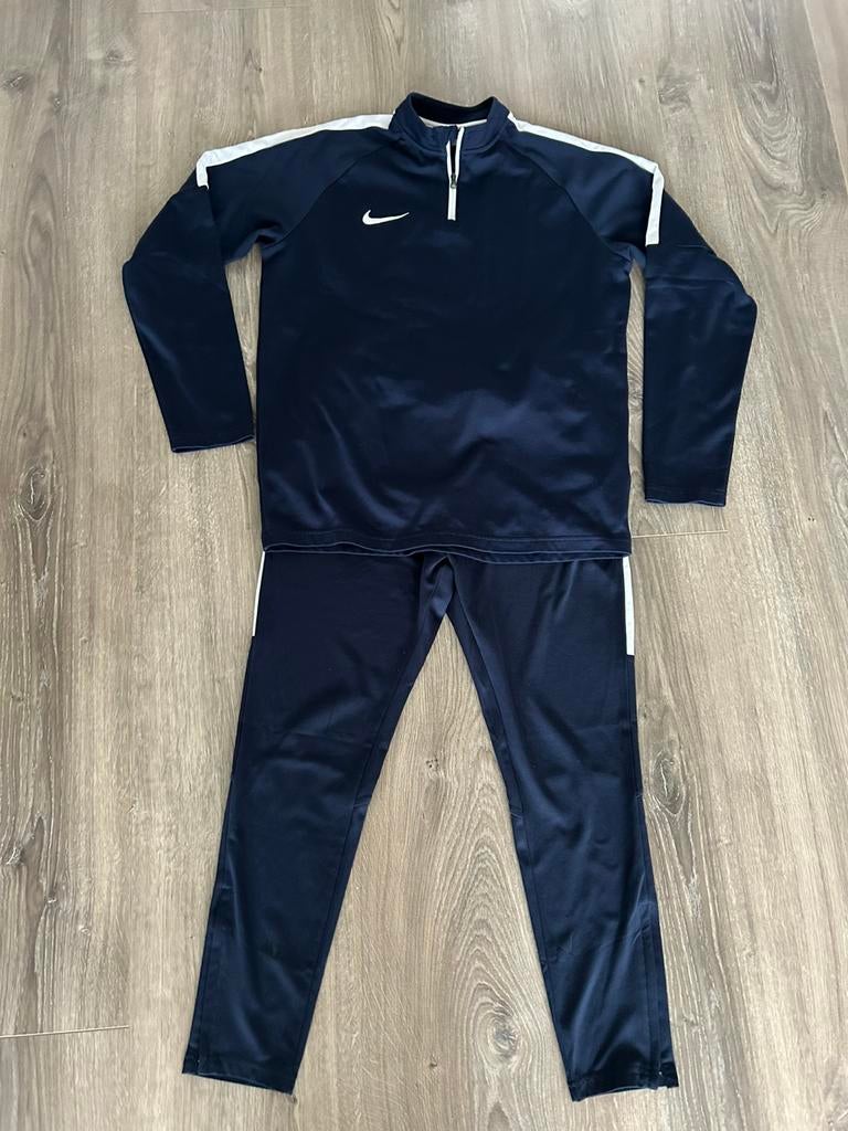 Nike trainingspak blauw/wit, Verzenden, Zo goed als nieuw, Jongen of Meisje, Sport- of Zwemkleding