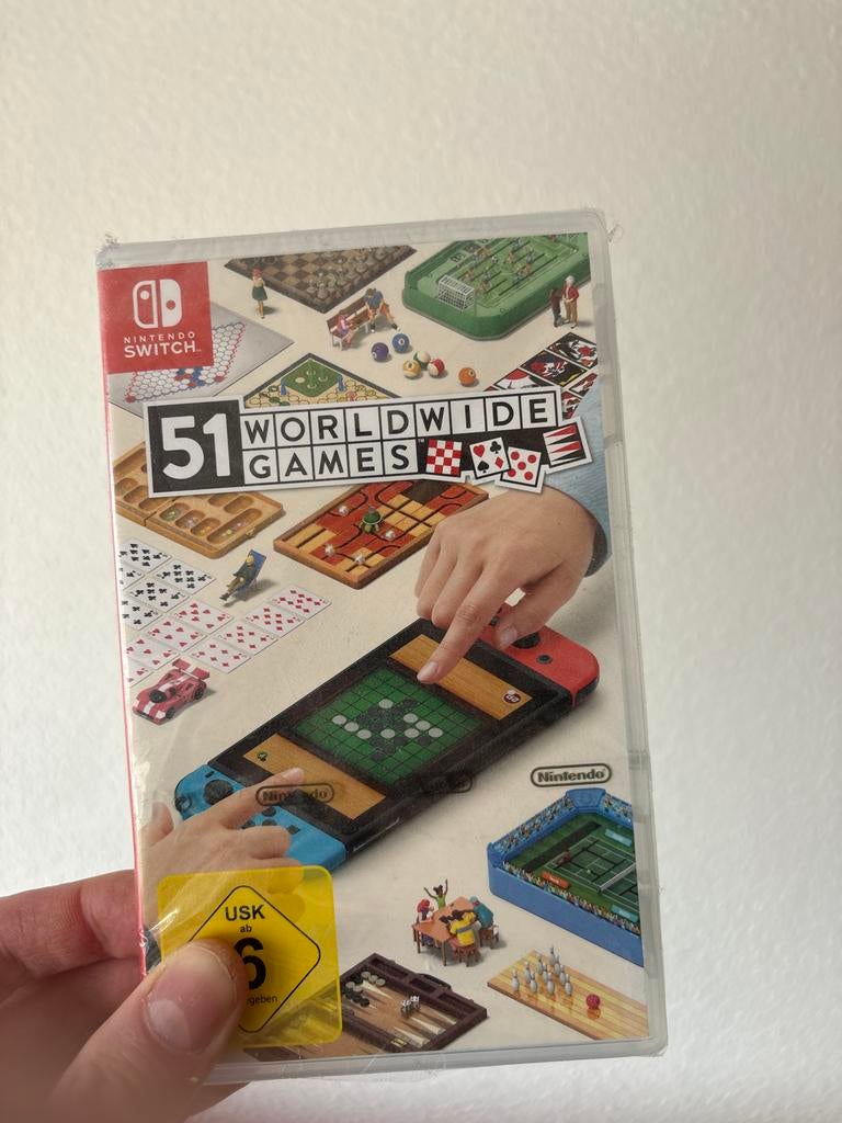 51 Worldwide Games Nintendo Switch - Zo goed als nieuw, Spelcomputers en Games, Games | Nintendo Switch, Overige genres, Eén computer