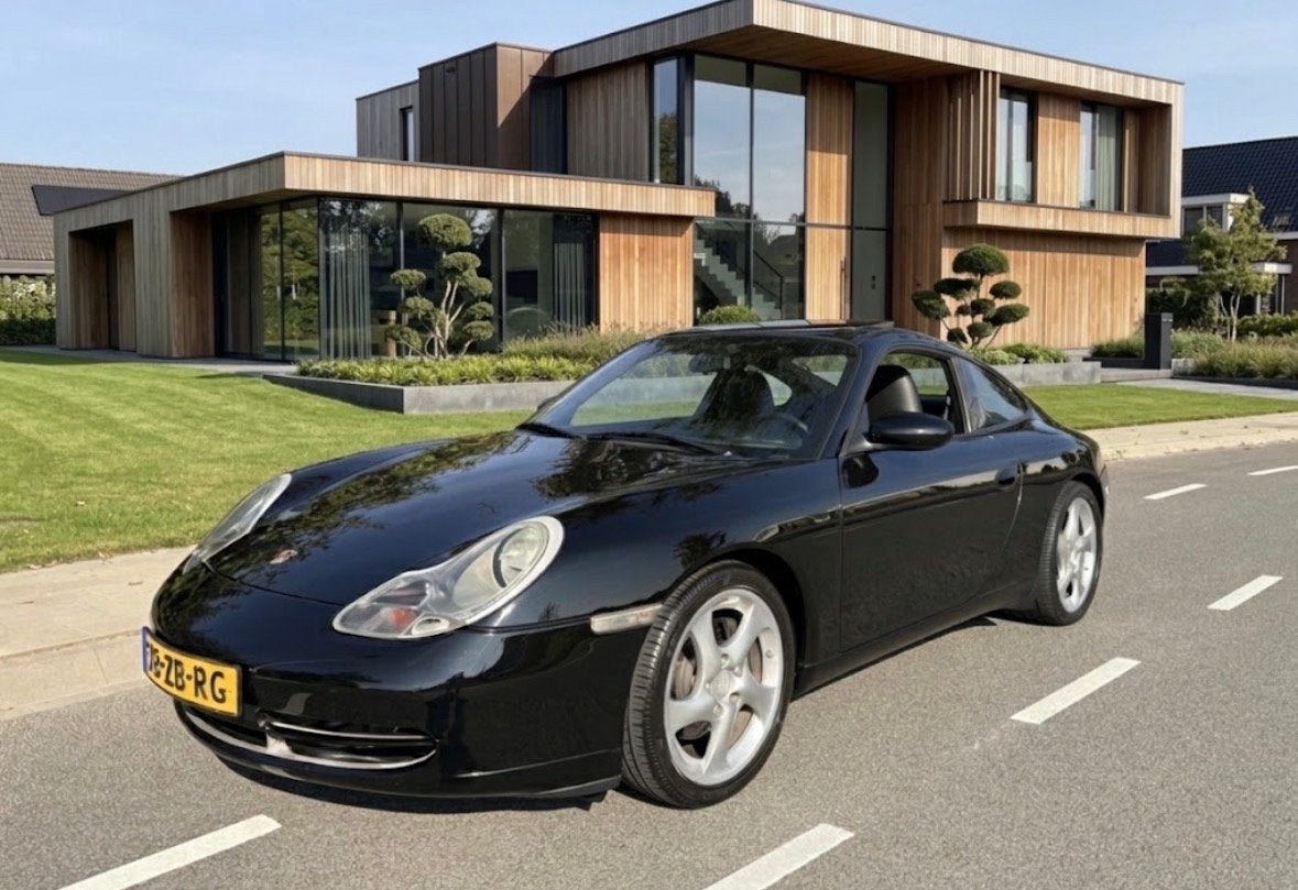 Porsche 911 3.4 Carrera Coupe AUT 1998 Zwart, Auto's, Automaat, Achterwielaandrijving, 4 stoelen, Zwart
