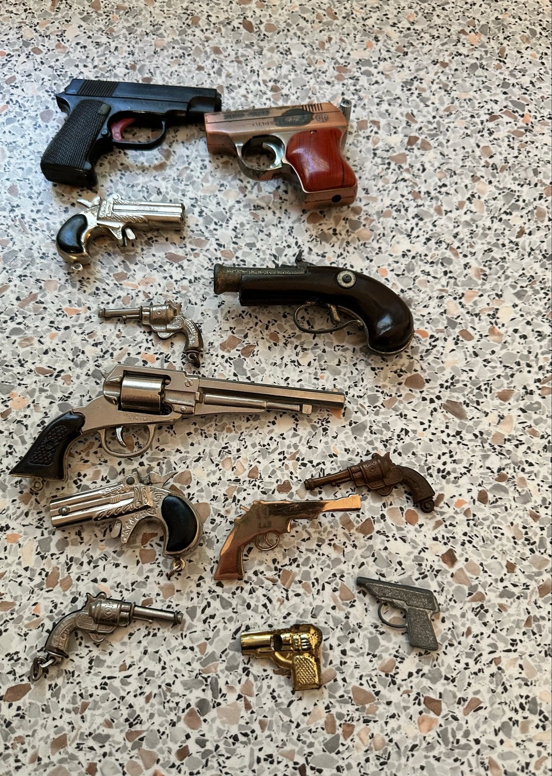 Verzameling van diverse miniatuur pistolen en revolvers, Ophalen of Verzenden, Gebruikt