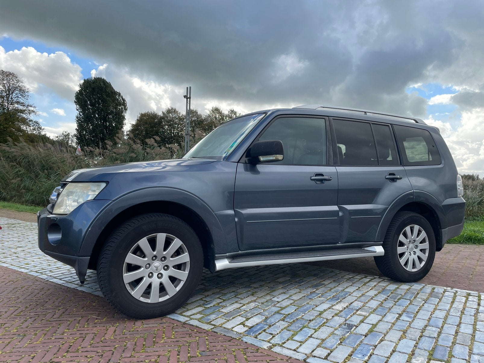 Mitsubishi Pajero 3.2D automaat, Auto's, Automaat, Zwart, 4 cilinders, Blauw