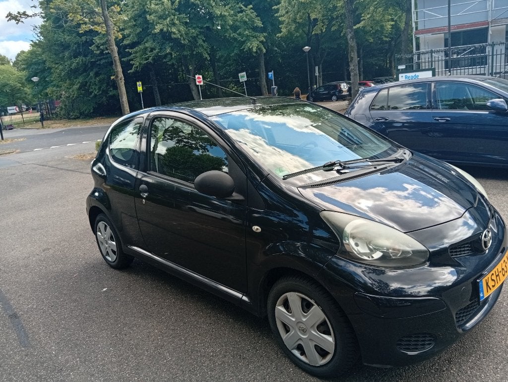 Toyota Aygo 1.0 12V Vvt-i 3DRS MMT 2009 Zwart, Auto's, Voorwielaandrijving, Stof, Zwart, 4 stoelen