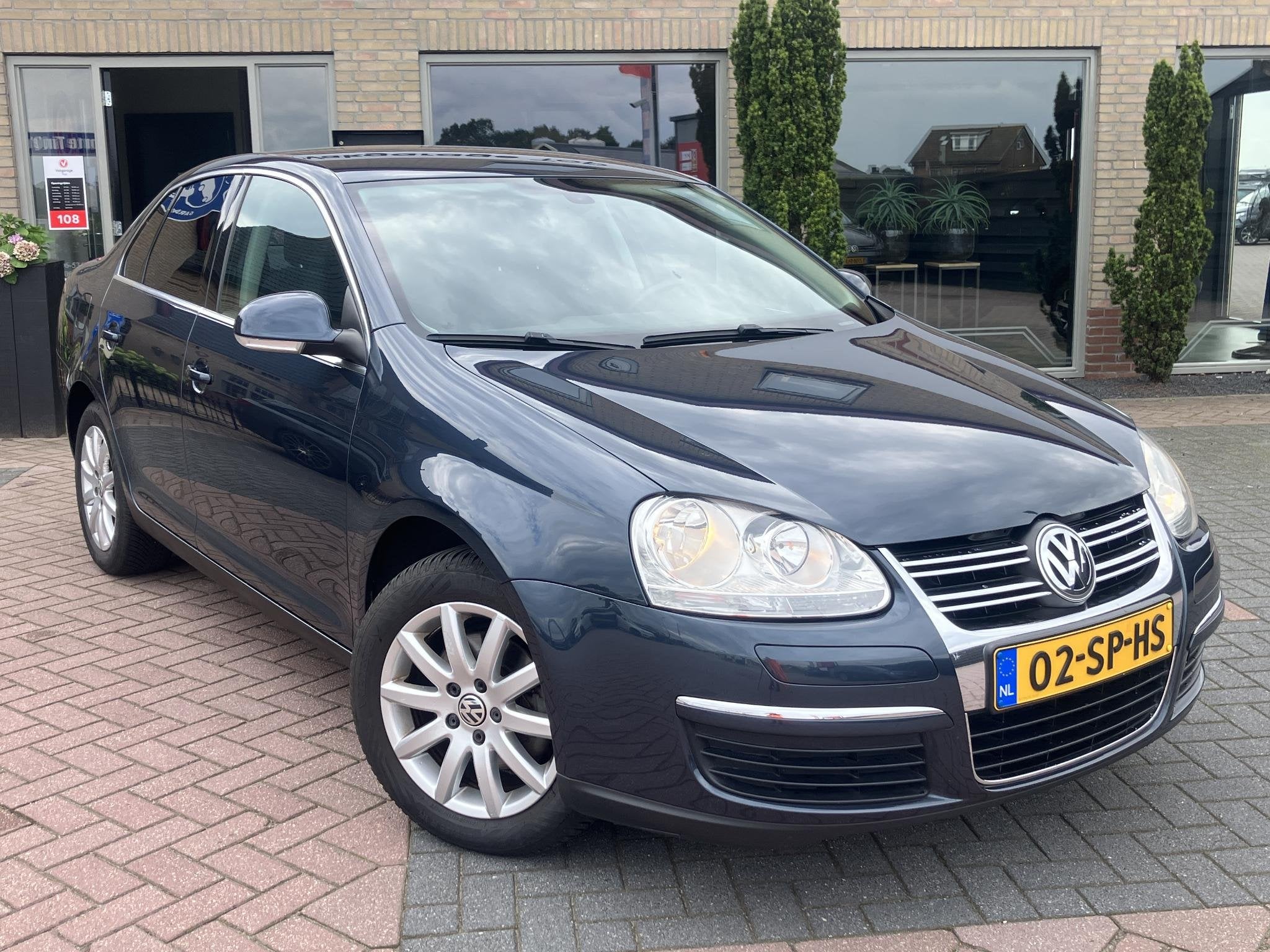Volkswagen Jetta 2.0 FSI Comfortline | Trekhaak | PDC | Navi, Auto's, Gebruikt, Zwart, 4 cilinders, Origineel Nederlands