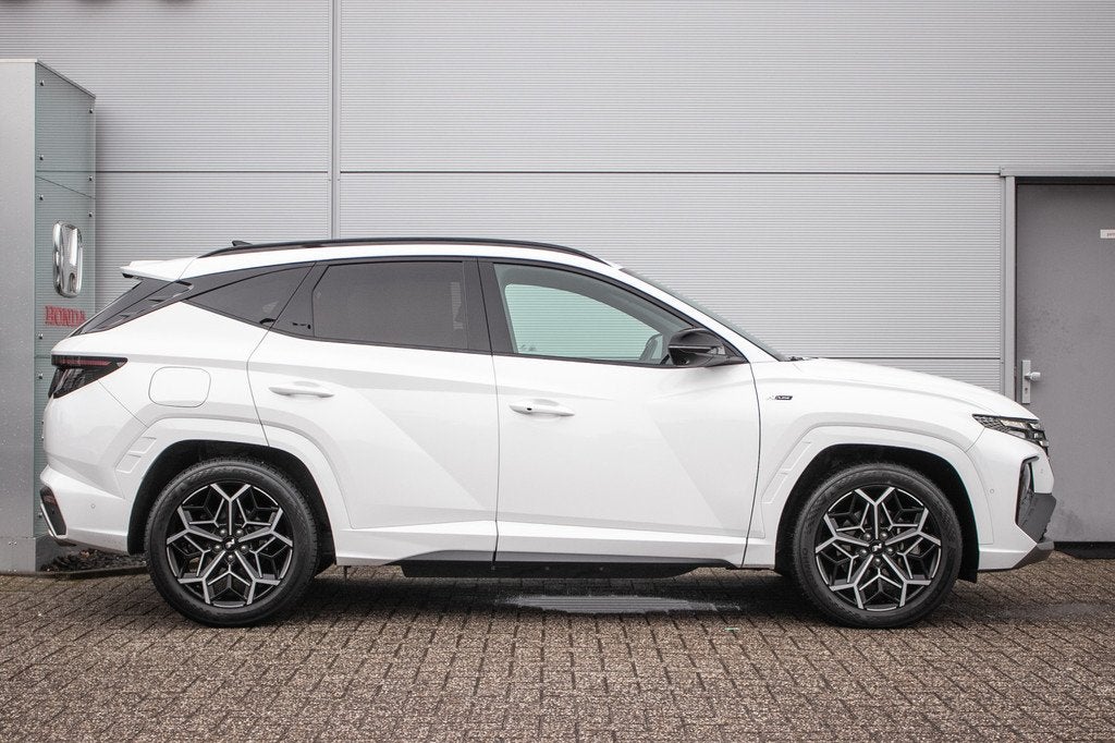 Hyundai Tucson 1.6 T-GDI PHEV N Line 4WD | Stoelverw.+vent., Auto's, Hyundai, Gebruikt, Euro 6, 4 cilinders, Leder en Stof