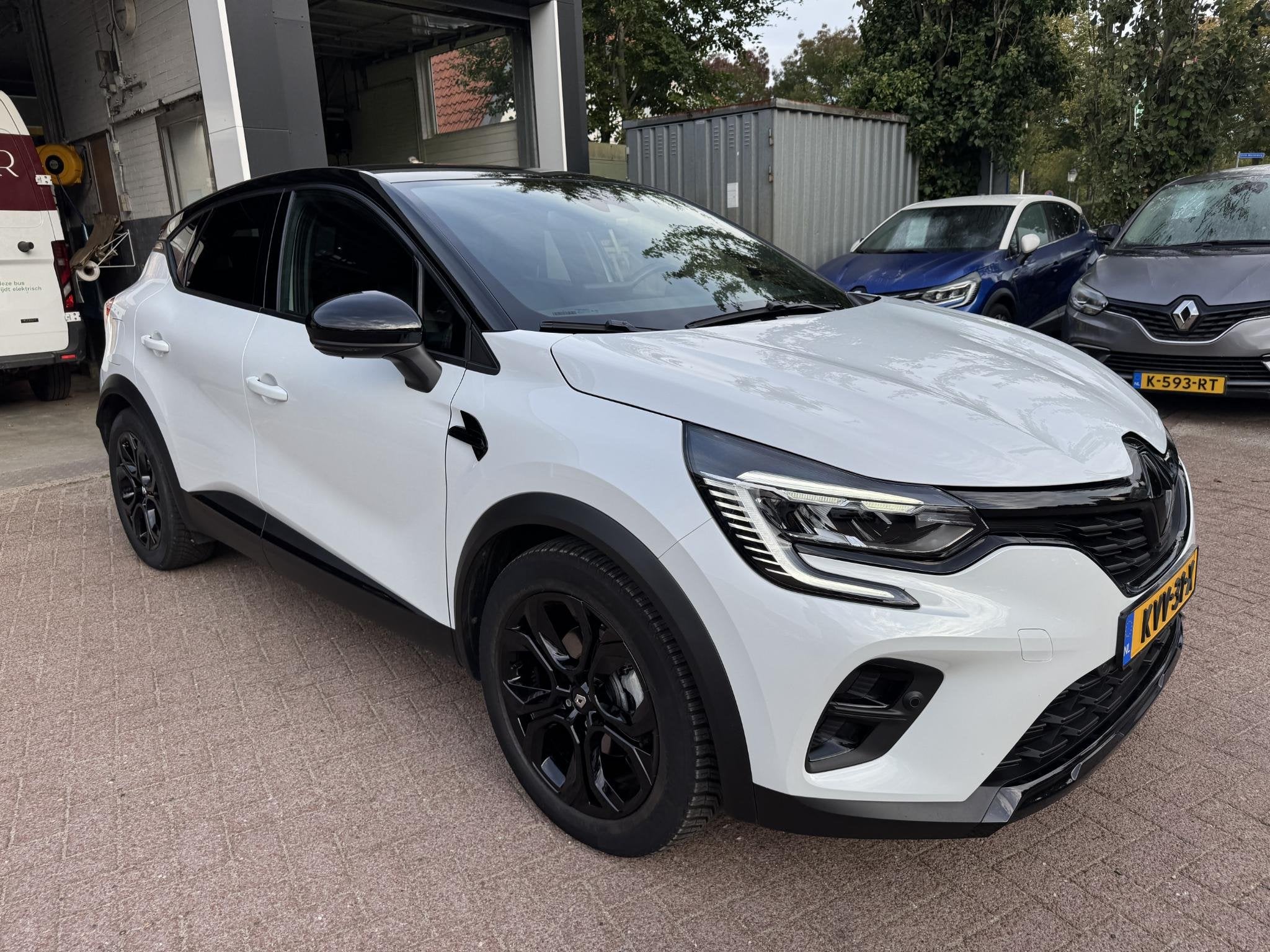 Renault Captur 1.6 E-Tech Hybrid 145 Rive Gauche, Auto's, Gebruikt, 715 kg, Leder en Stof, Wit