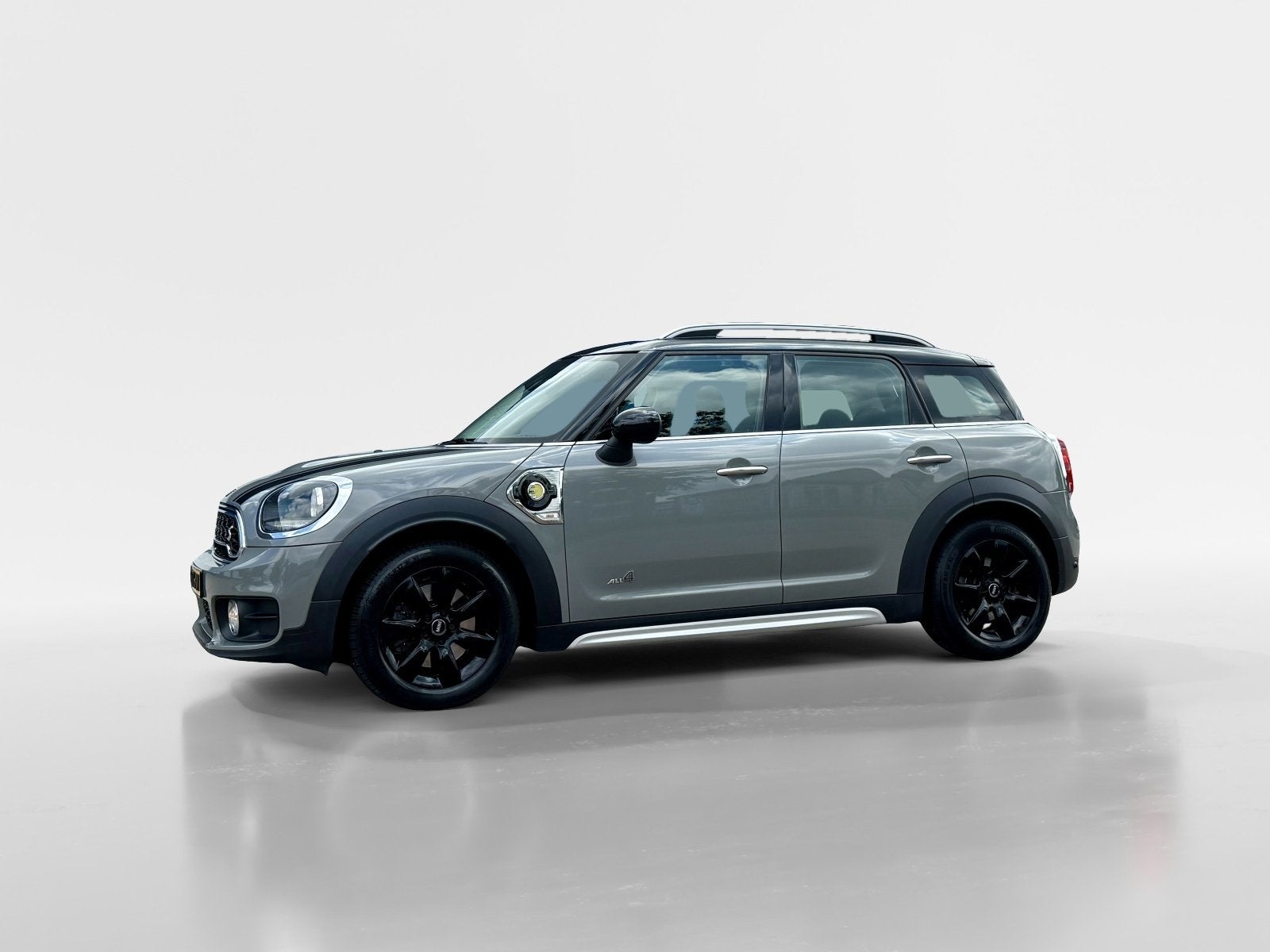 Mini Countryman 1.5 Cooper S E ALL4 Automaat / Panoramadak, Auto's, Mini, 136 pk, Gebruikt, Leder en Stof, Plug-in hybride
