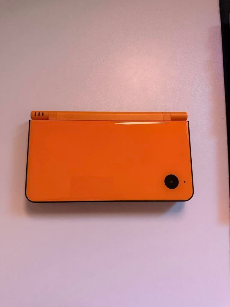 Gele Nintendo DSi XL met lader, pen en silicone hoes, Dsi XL, Gebruikt, Geel, Ophalen of Verzenden