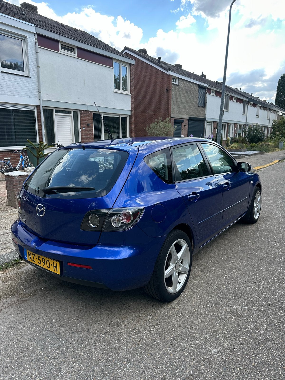 Mazda 3 Hatchback 2007, Voorwielaandrijving, 4 cilinders, 1165 kg, Blauw