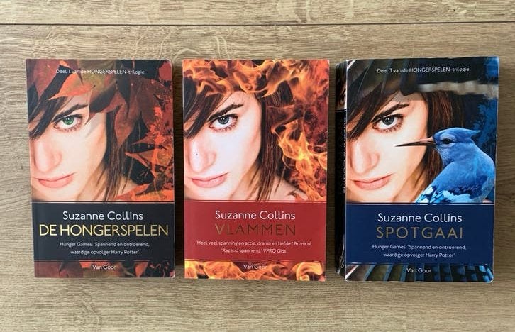 Katniss 3 delen hongerspelen vlammen spotgaai suzanne colins, Boeken, Ophalen of Verzenden, Gelezen