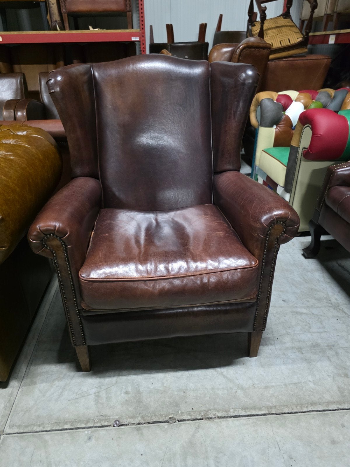 Schapenleren oor fauteuil bruin rood + BEZORGING GRATIS