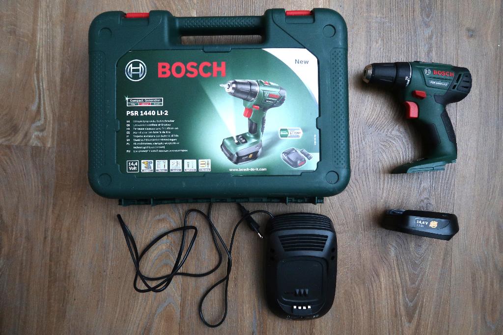 Bosch PSR 1440 LI-2 accu boormachine met lader, accu, koffer, Ophalen, Zo goed als nieuw, Boor- en Schroefmachine, Variabele snelheid
