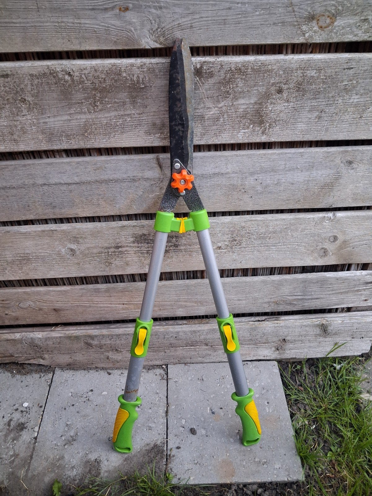 uitschuifbare heggenschaar, Ophalen