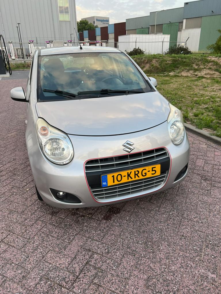 Suzuki Alto 1.0 2010 Grijs, Auto's, Voorwielaandrijving, 200 kg, 4 stoelen, Origineel Nederlands