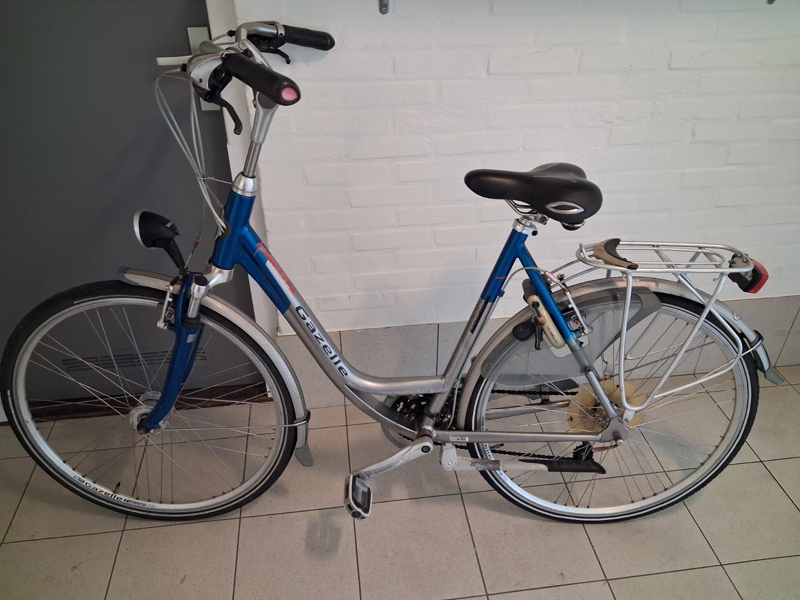 Gazelle damesfiets i.g.st. Zie foto's, Fietsen en Brommers, Ophalen, Gebruikt, Velgrem, Versnellingen