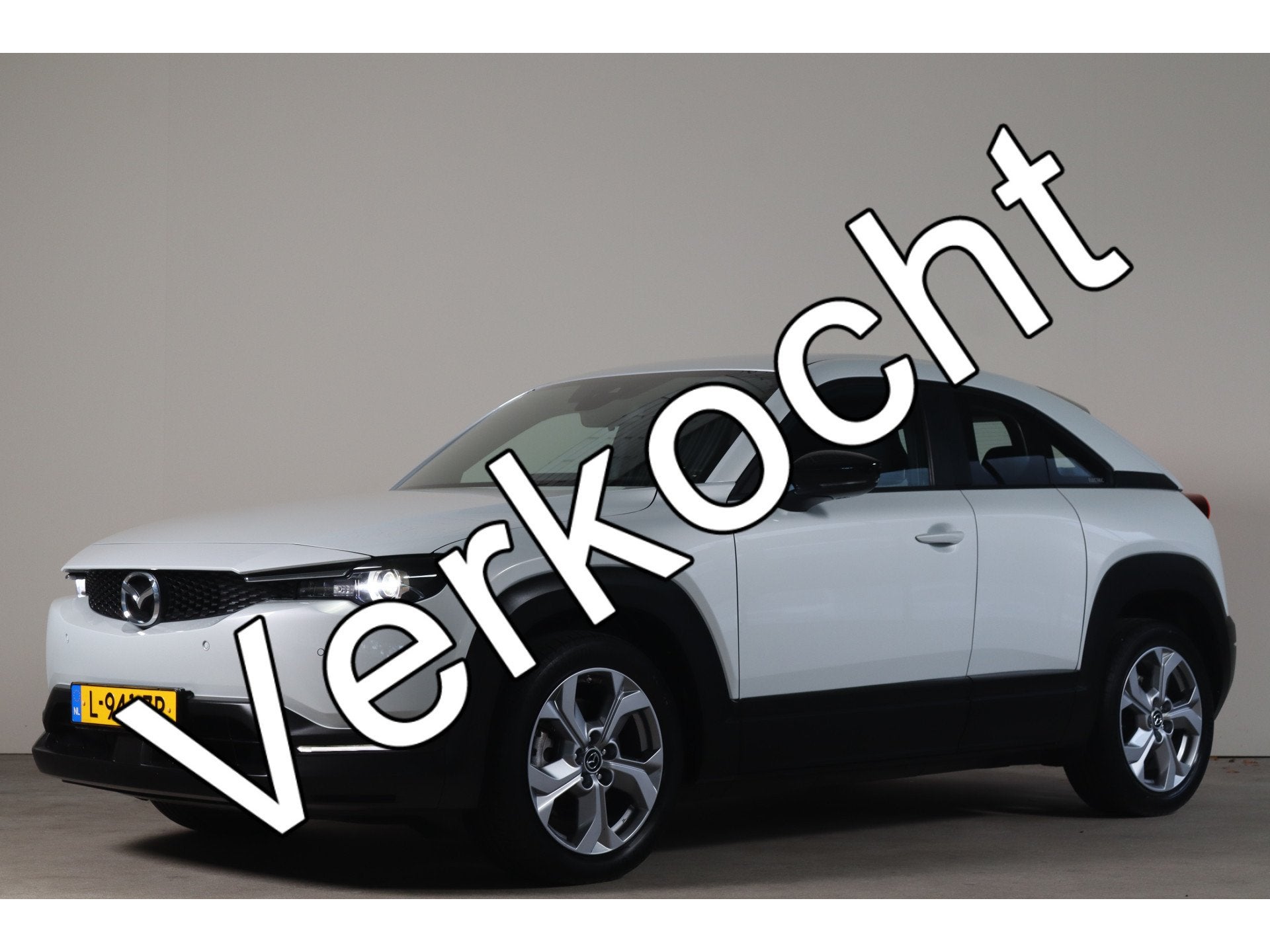 Mazda MX-30 e-SkyActiv 145 36 kWh - NL Auto! Head Up I Adap, Auto's, Stof, Gebruikt, 35 kWh, Wit